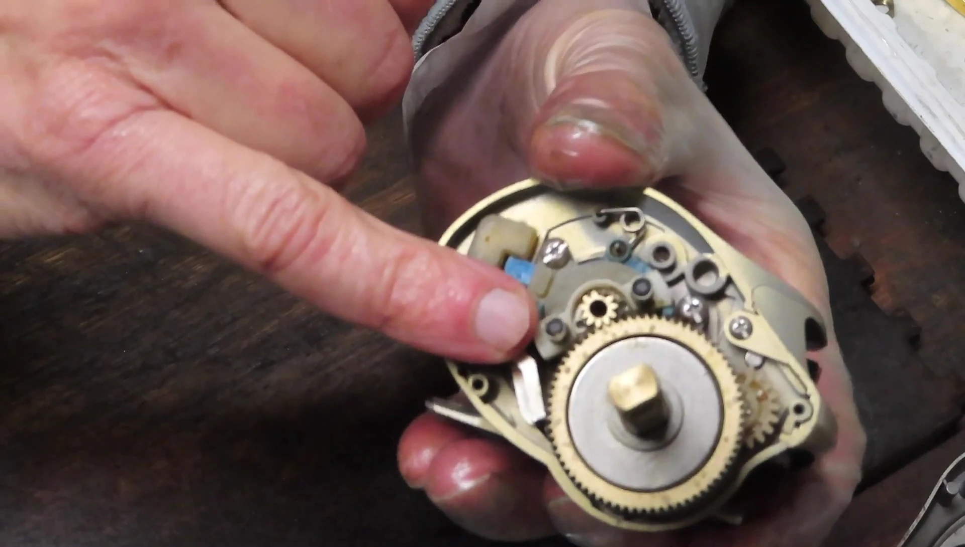 Removing the springs from the gear assembly