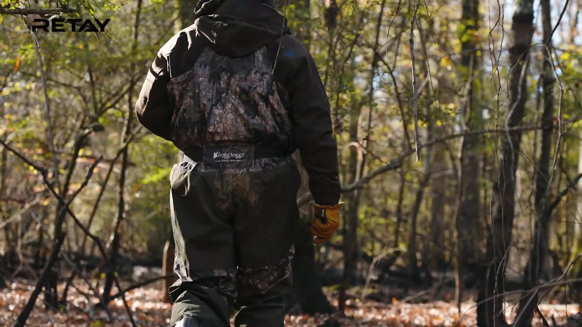 Person walking in Frogg Toggs waders, demonstrating comfort and ease of movement.