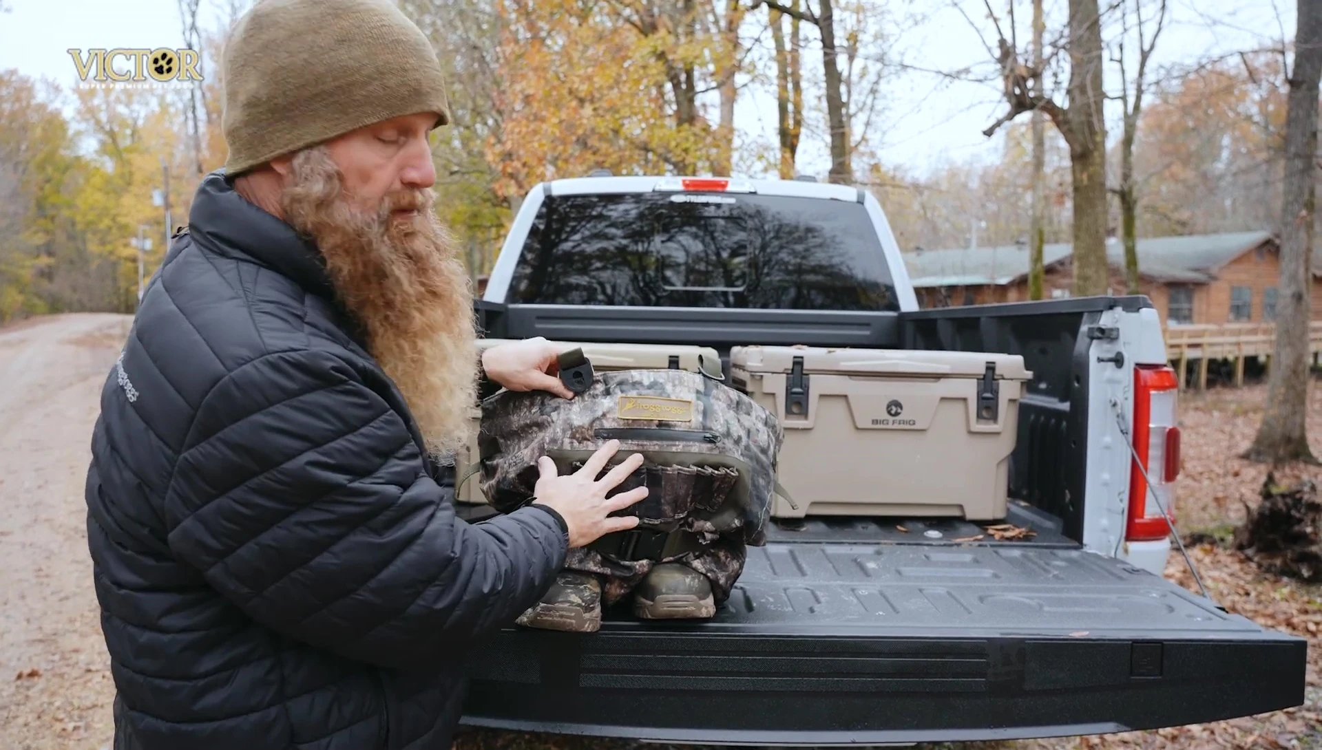 Person demonstrating how to easily remove the Frogg Toggs waders.