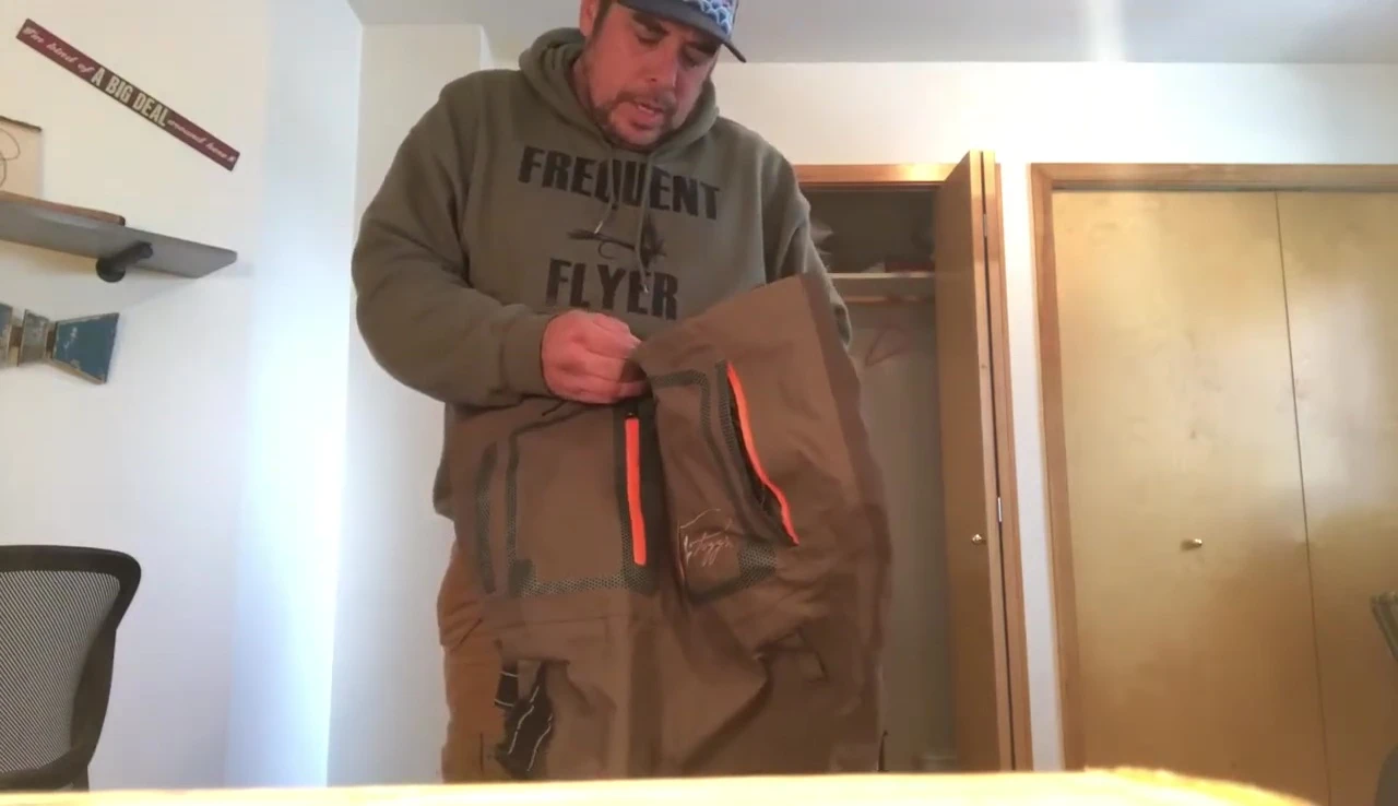 The reviewer showcasing the fit of the waders