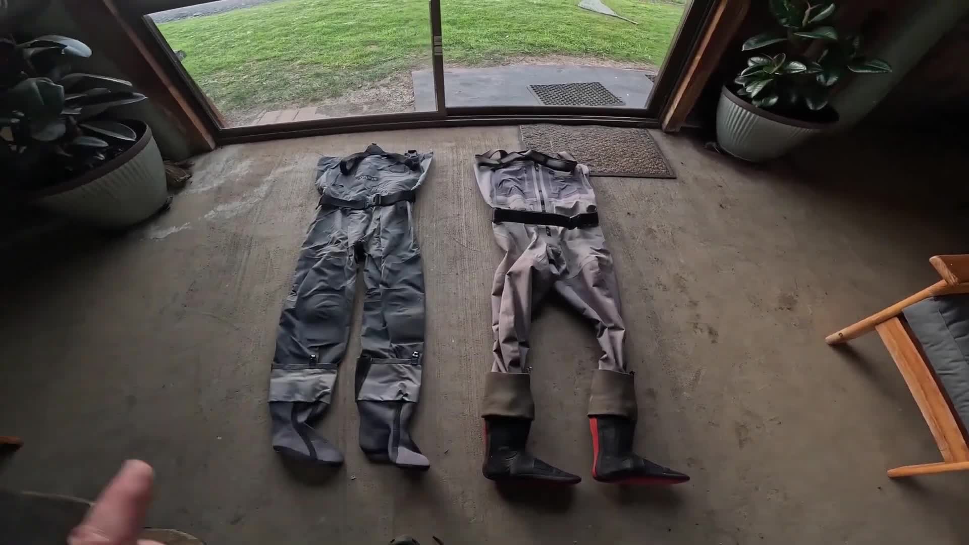 The reviewer holding the Orvis Pro waders.
