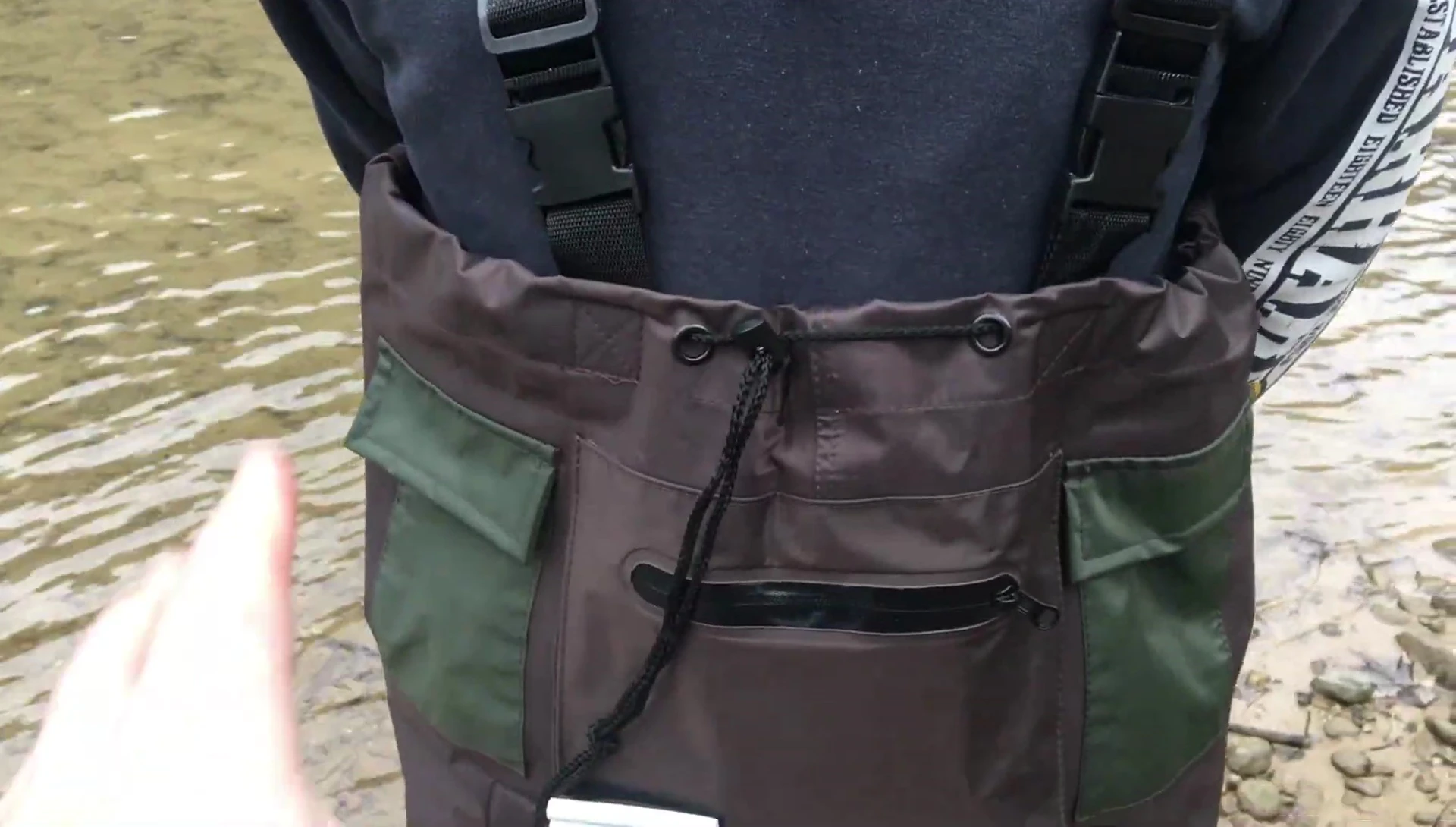 The two reviewers wearing the waders demonstrating the universal fit