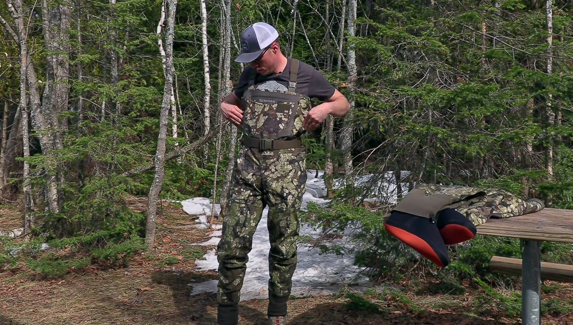 Close-up of the chest pocket and pass-through pocket of the new waders.