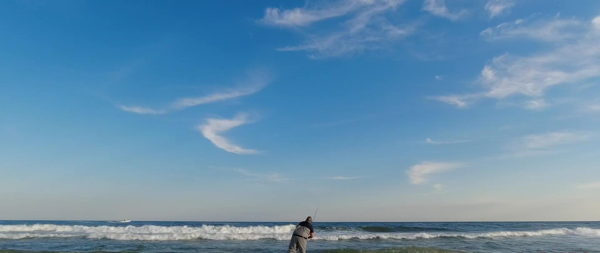 The reviewer standing in the water