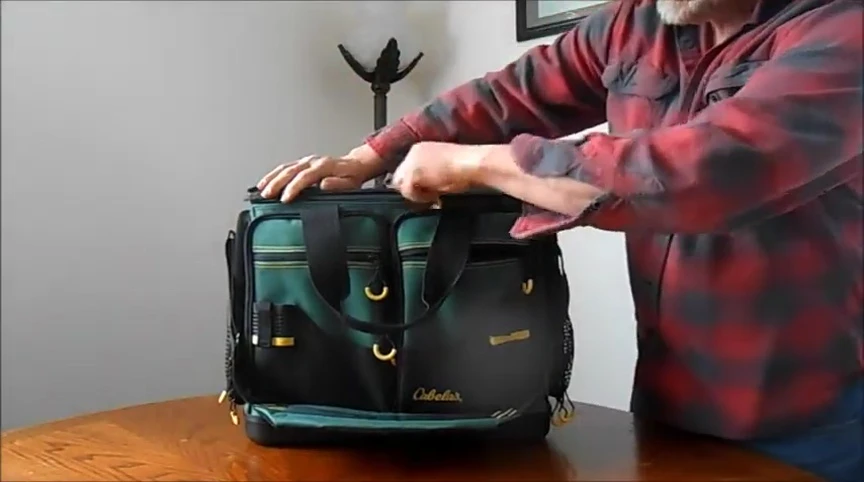 The interior of the tackle box showing the eight removable containers.