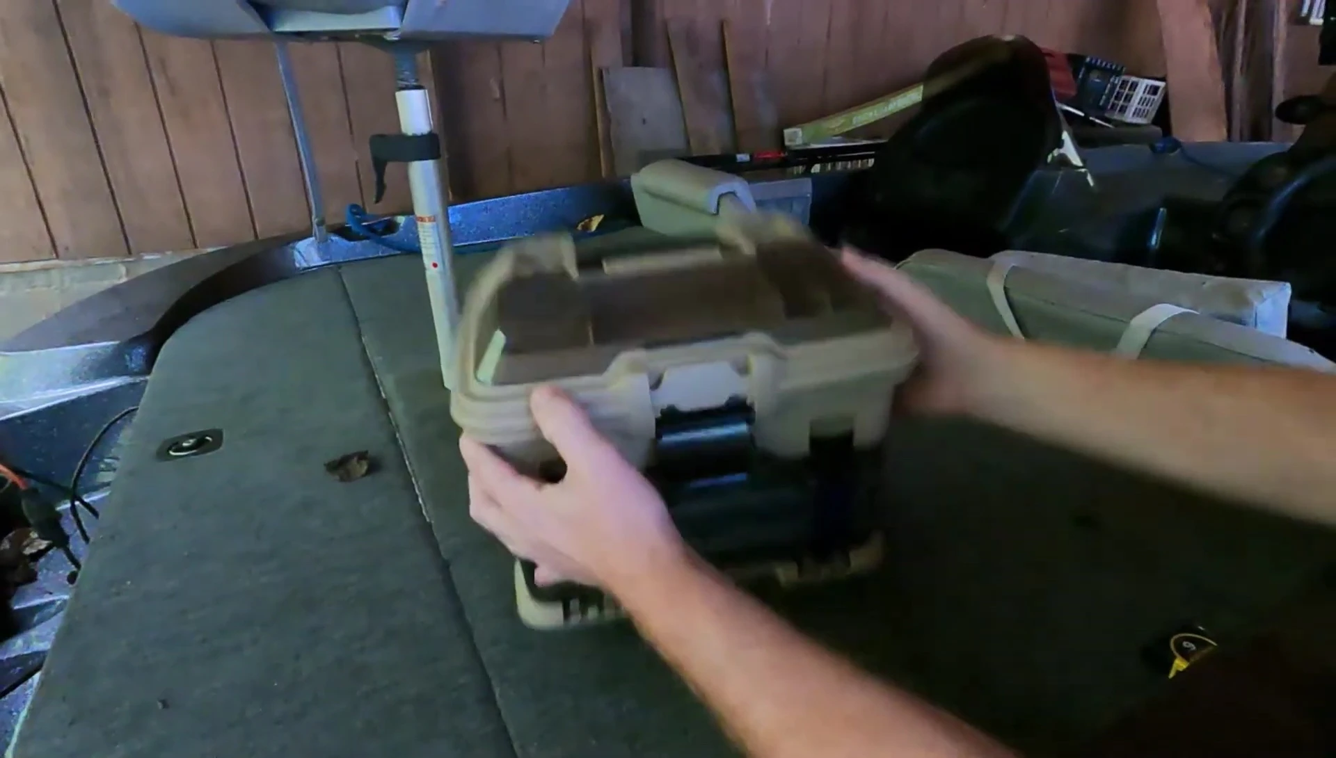 View of the small, separate compartment in the front with a pull-down lid.