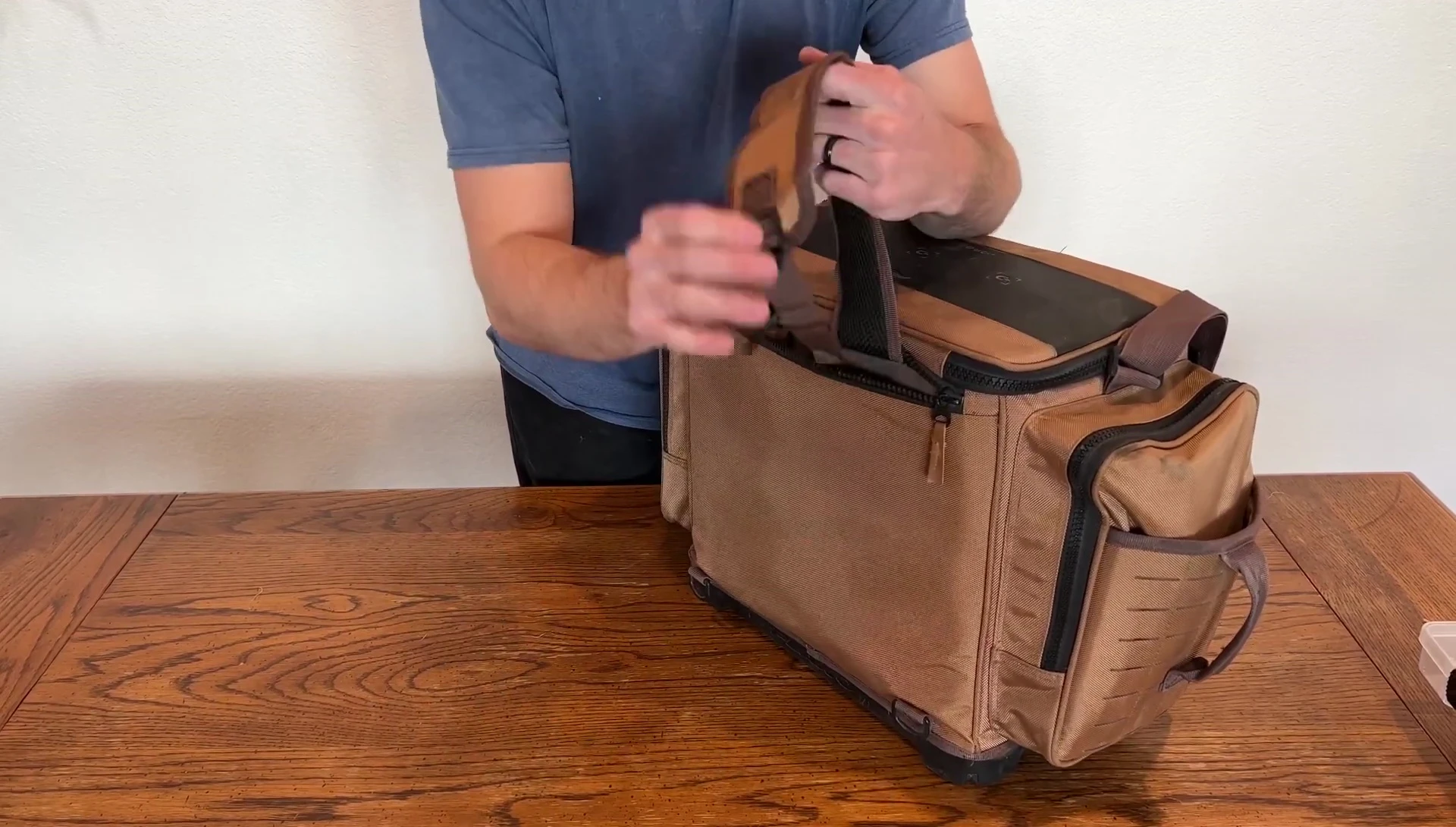 Backpack straps for carrying the bag.