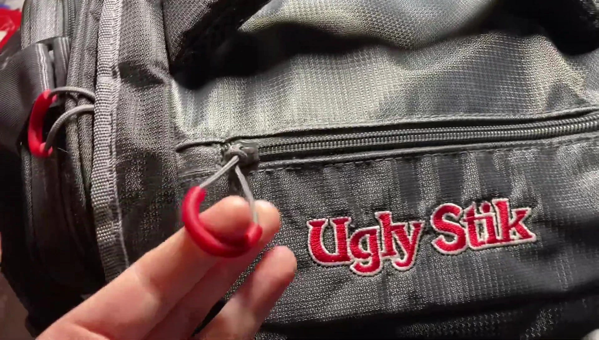 Close-up showcasing the easy-grip zippers.