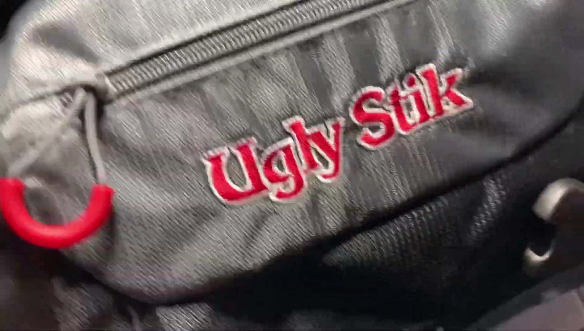 Showing the front pocket and its contents.