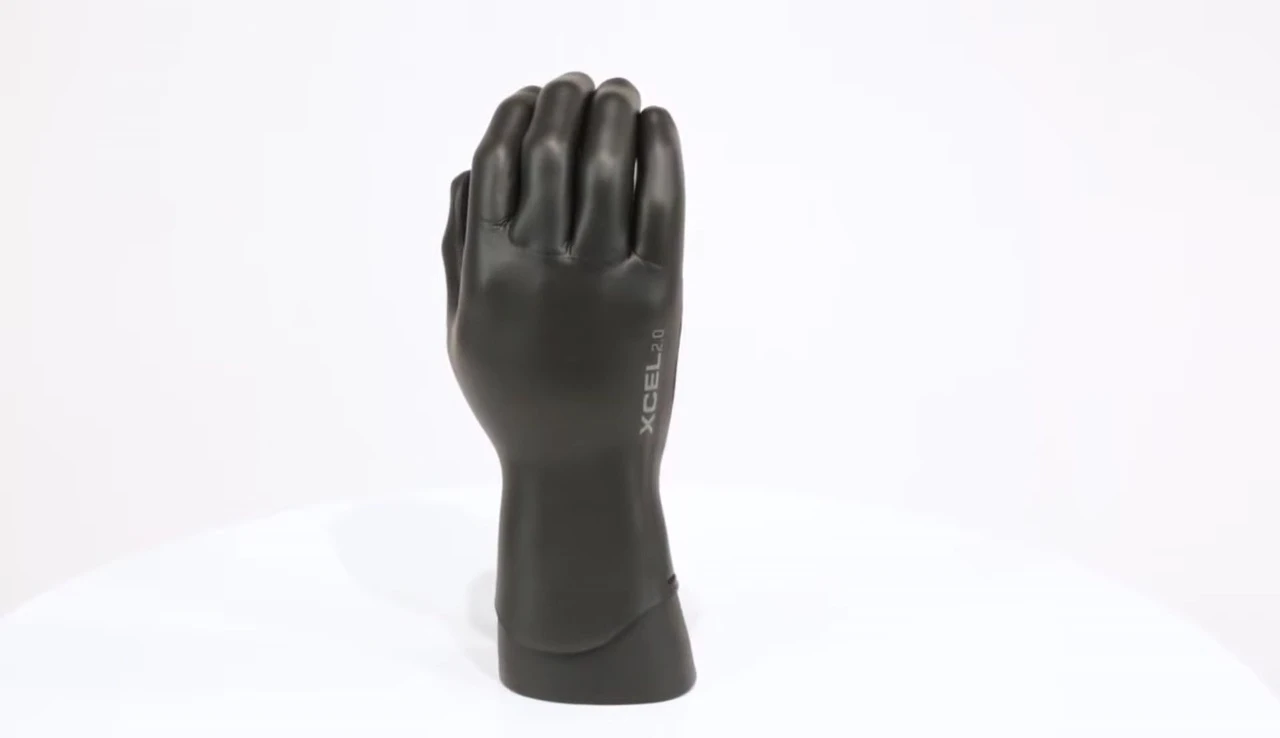 Close-up of the glove's outer material showing the seamless construction.