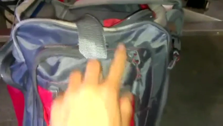 The front pockets of the tackle bag.