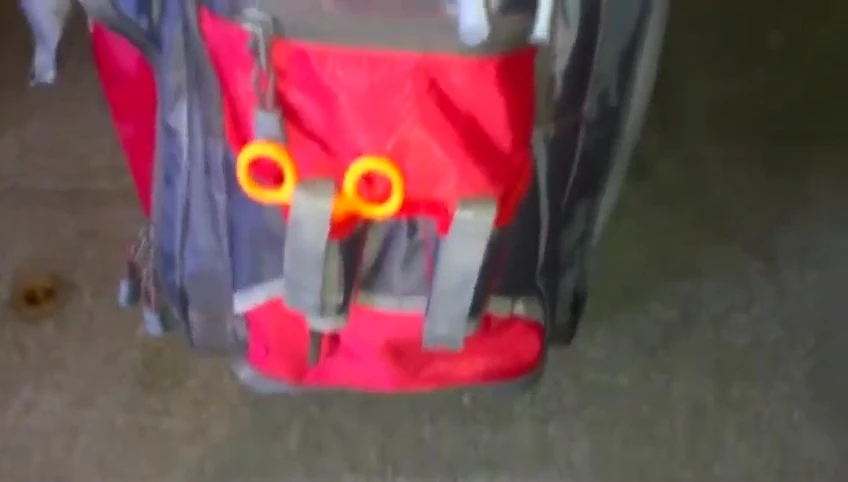 The tool straps on the bag.