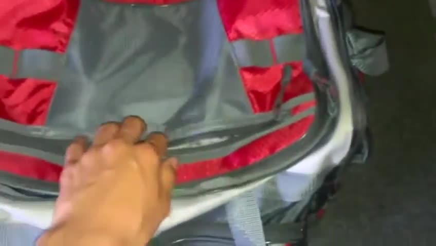 Close-up of the mesh zippered compartment on the tackle bag.