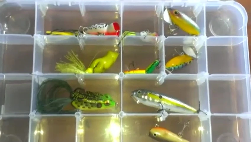 The topwater lure box with various lures.
