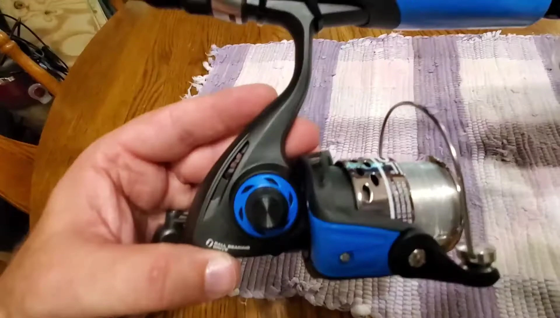 Close-up of the reel showing the handle and design features.