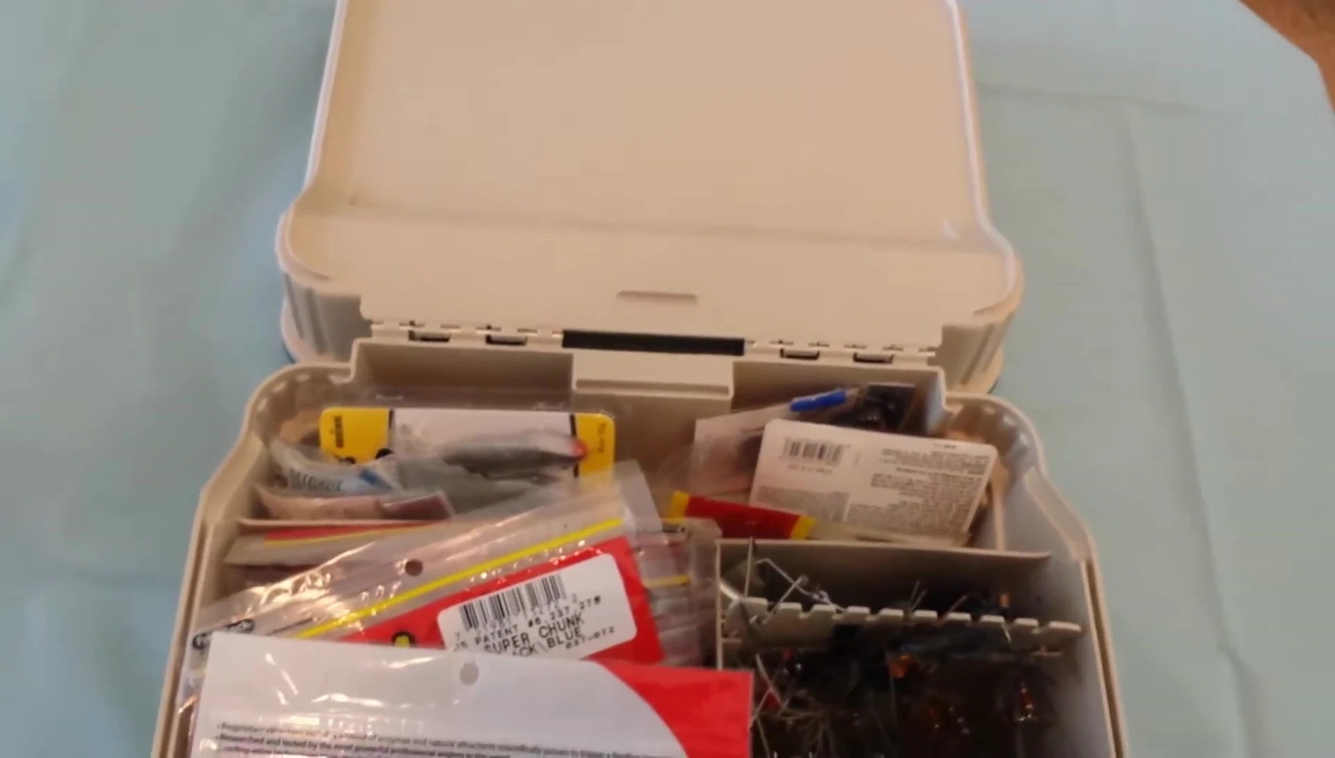 Interior view of the bottom compartment showing space for smaller boxes