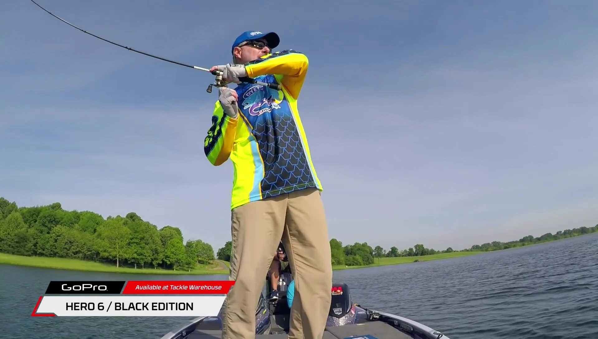 Angler reeling in another fish.
