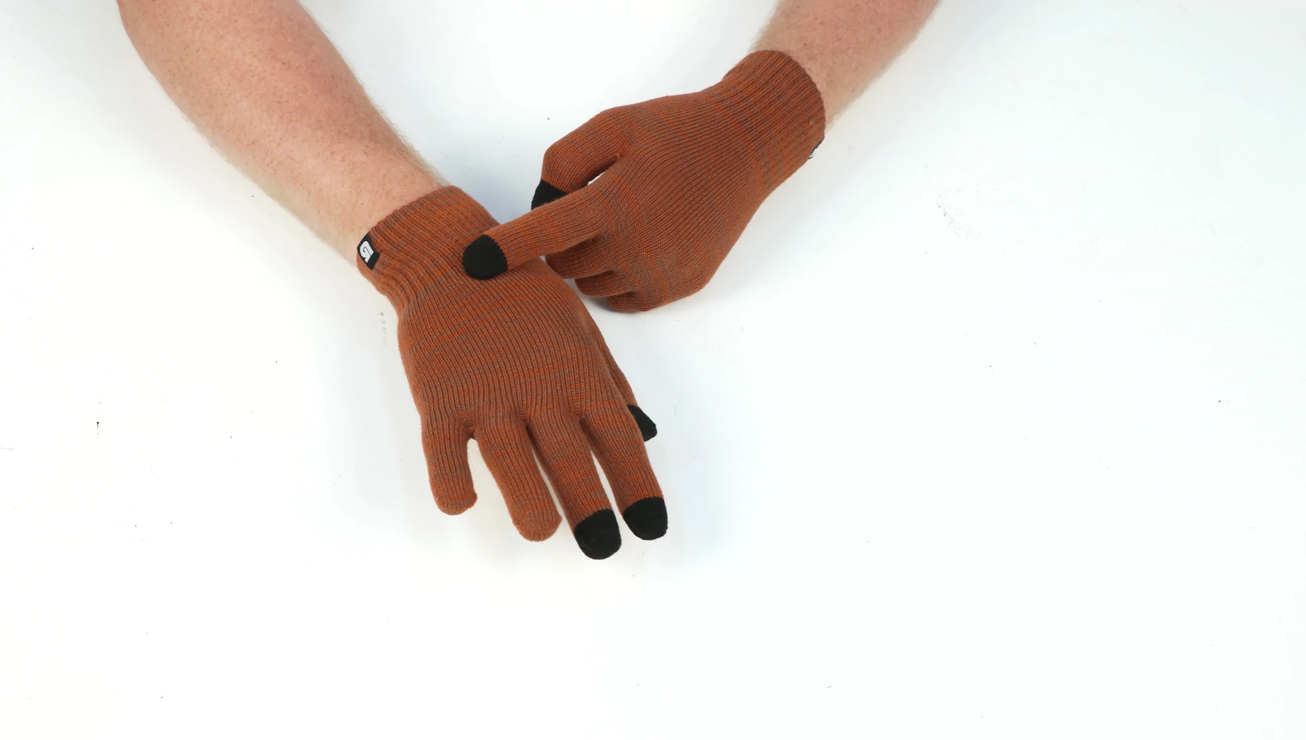 Highlighting the reinforced ribbed cuff.