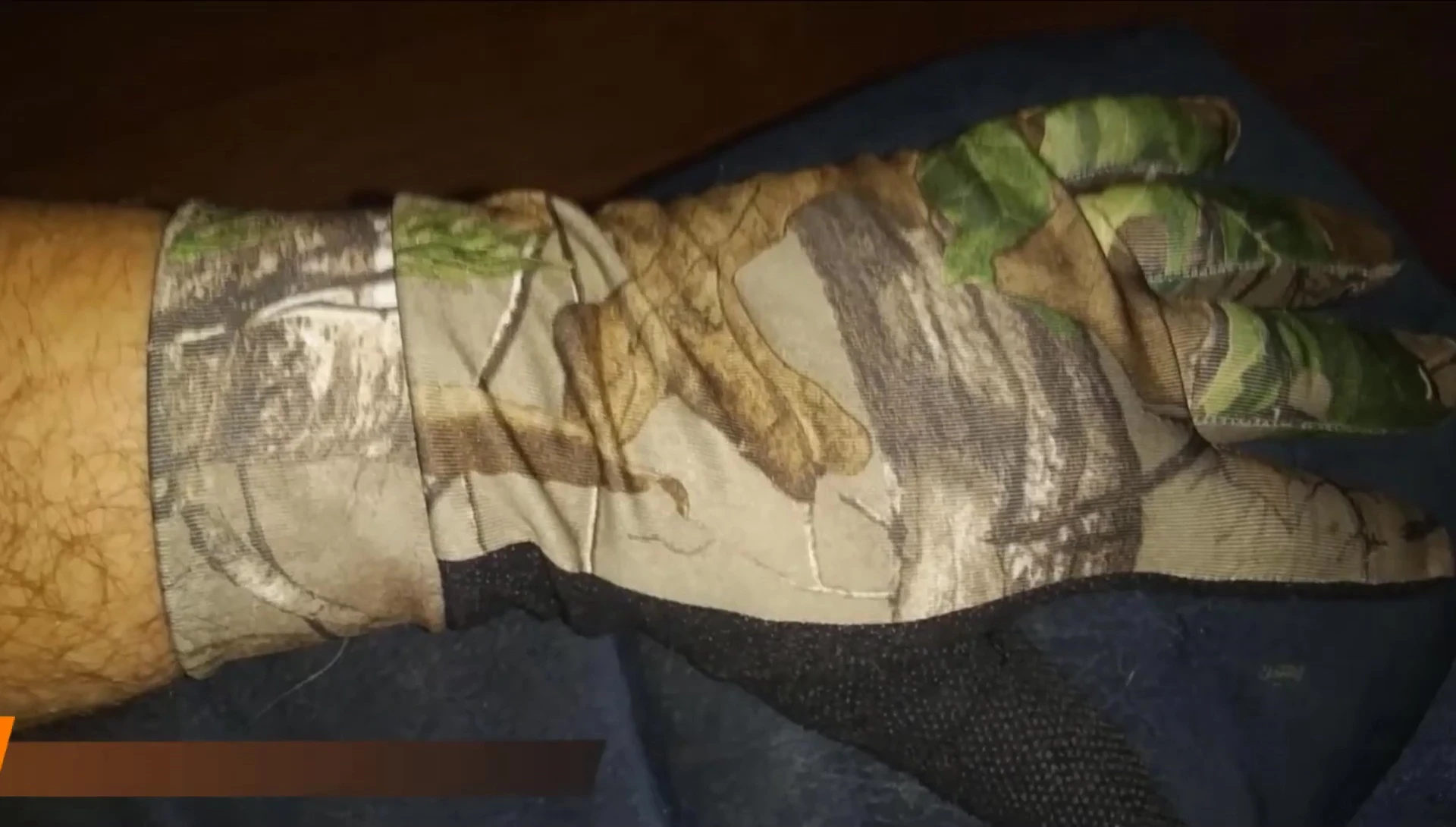 Showcasing the Primo Stretchfit Gloves and their camouflage pattern