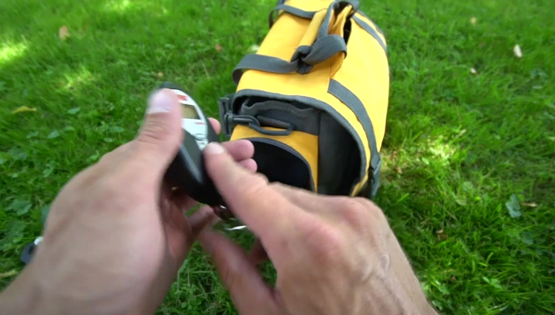 Speaker displaying the accessories inside the side pocket.