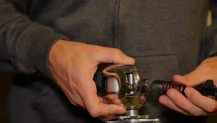 Clean reel seat: Spray and wipe the reel seat area to remove buildup.