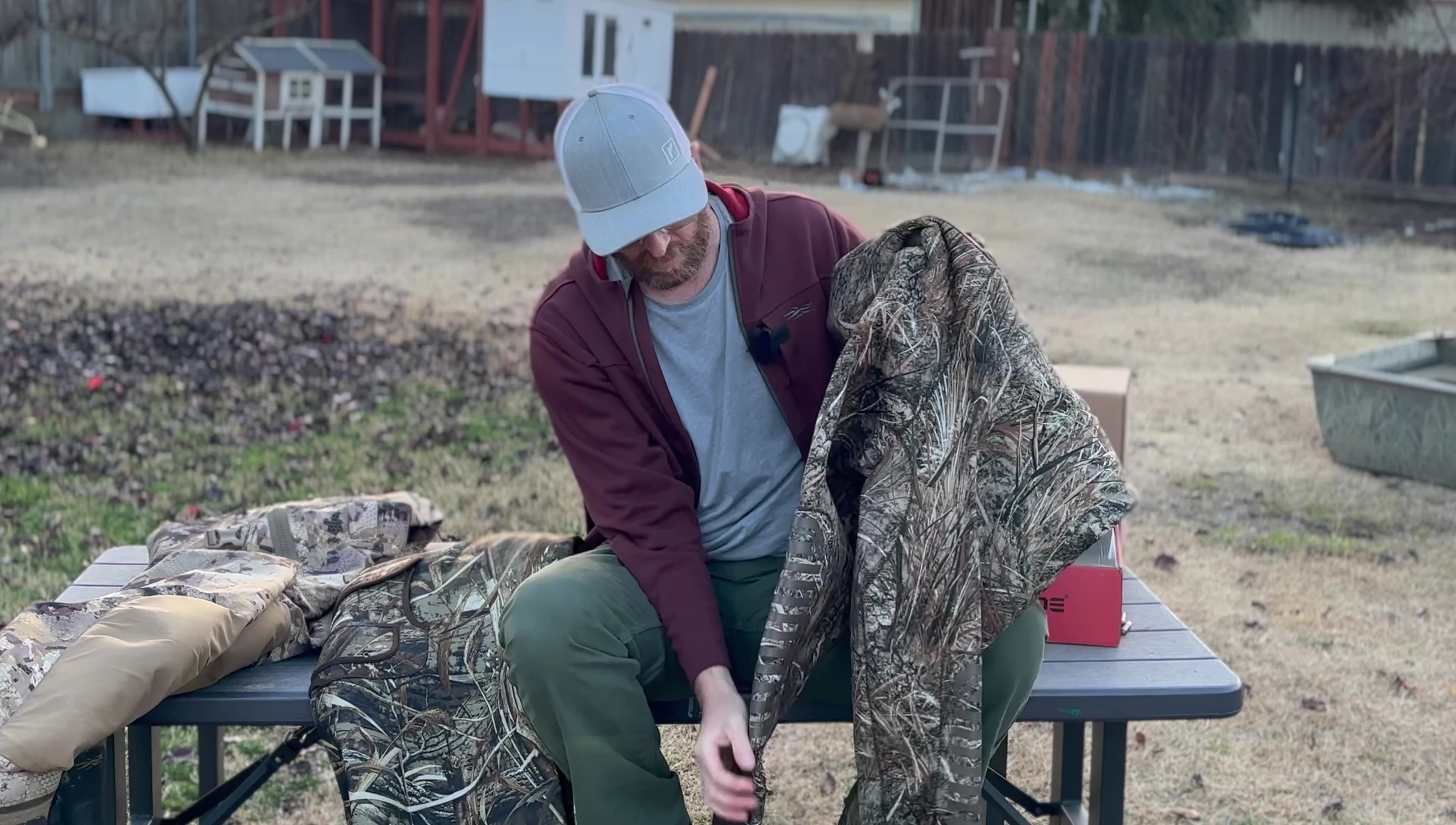 Showcasing the reinforced knees of the Dry Code waders.
