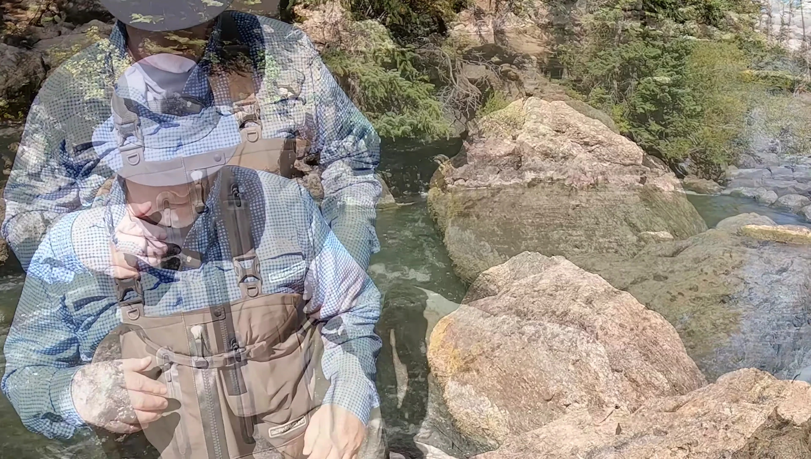 The reviewer pointing to the pockets on the waders.