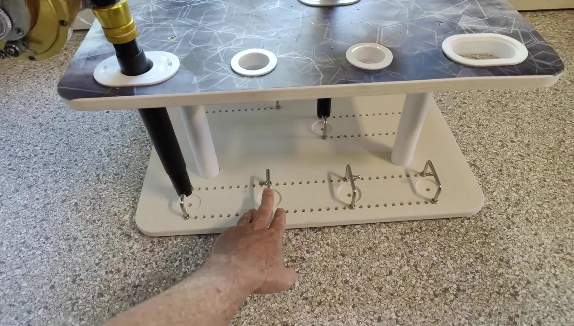 Close-up of the stainless steel adjustable hooks