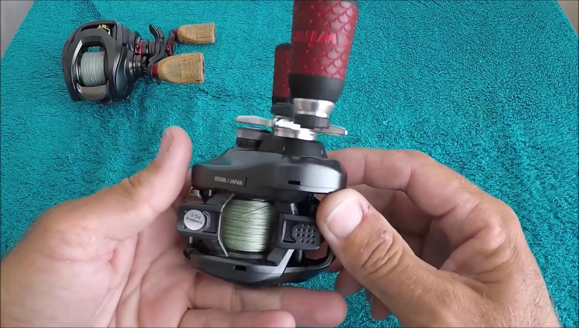 Close-up of the Daiwa Steez SV TW reel specifications, highlighting the 7-speed gear ratio.