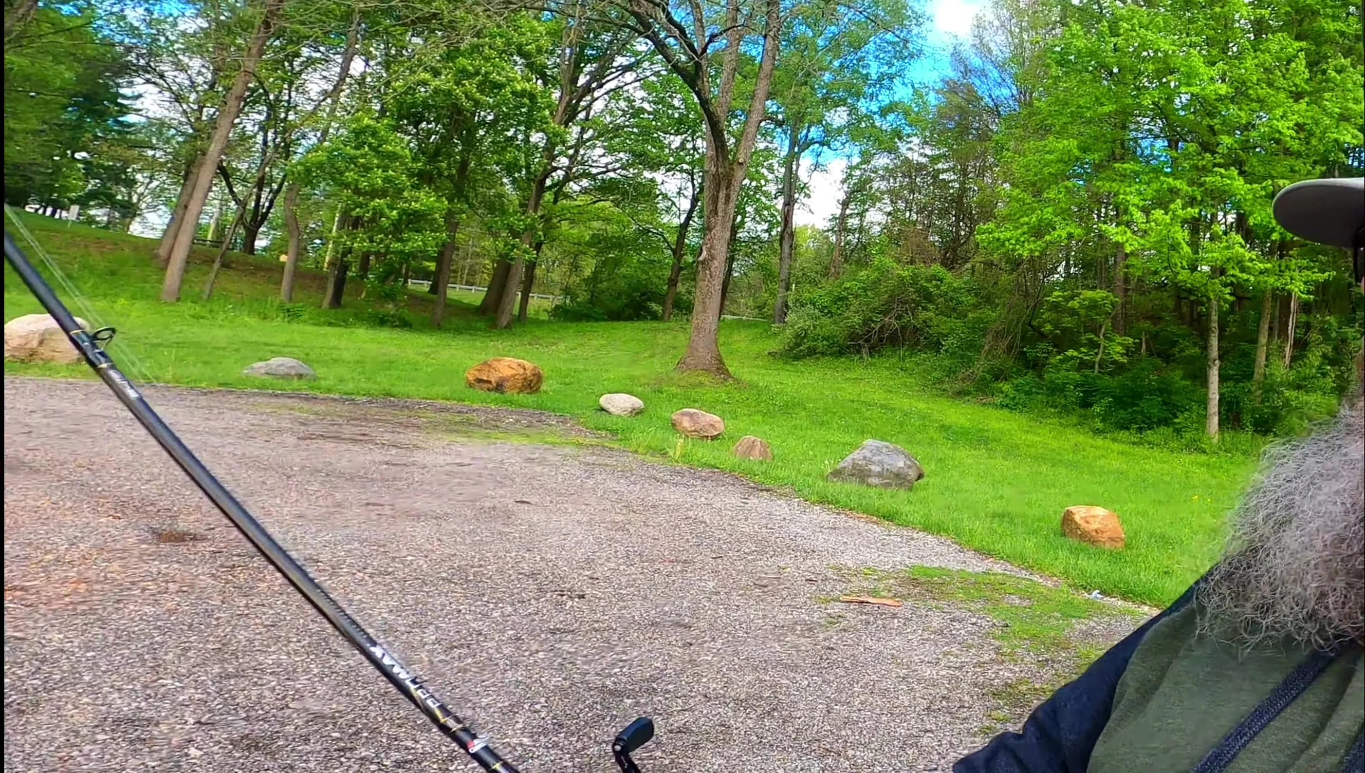 The reviewer holding the rod, showcasing its feel and balance.