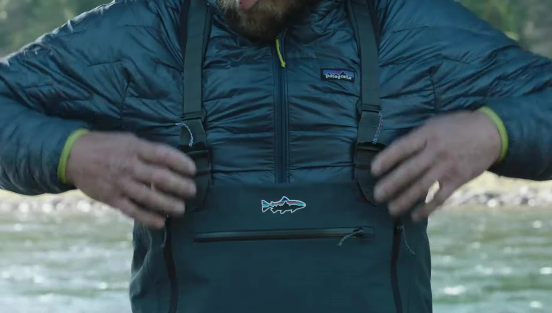 Close-up showcasing the padded shoulder straps and top hem cinch system.