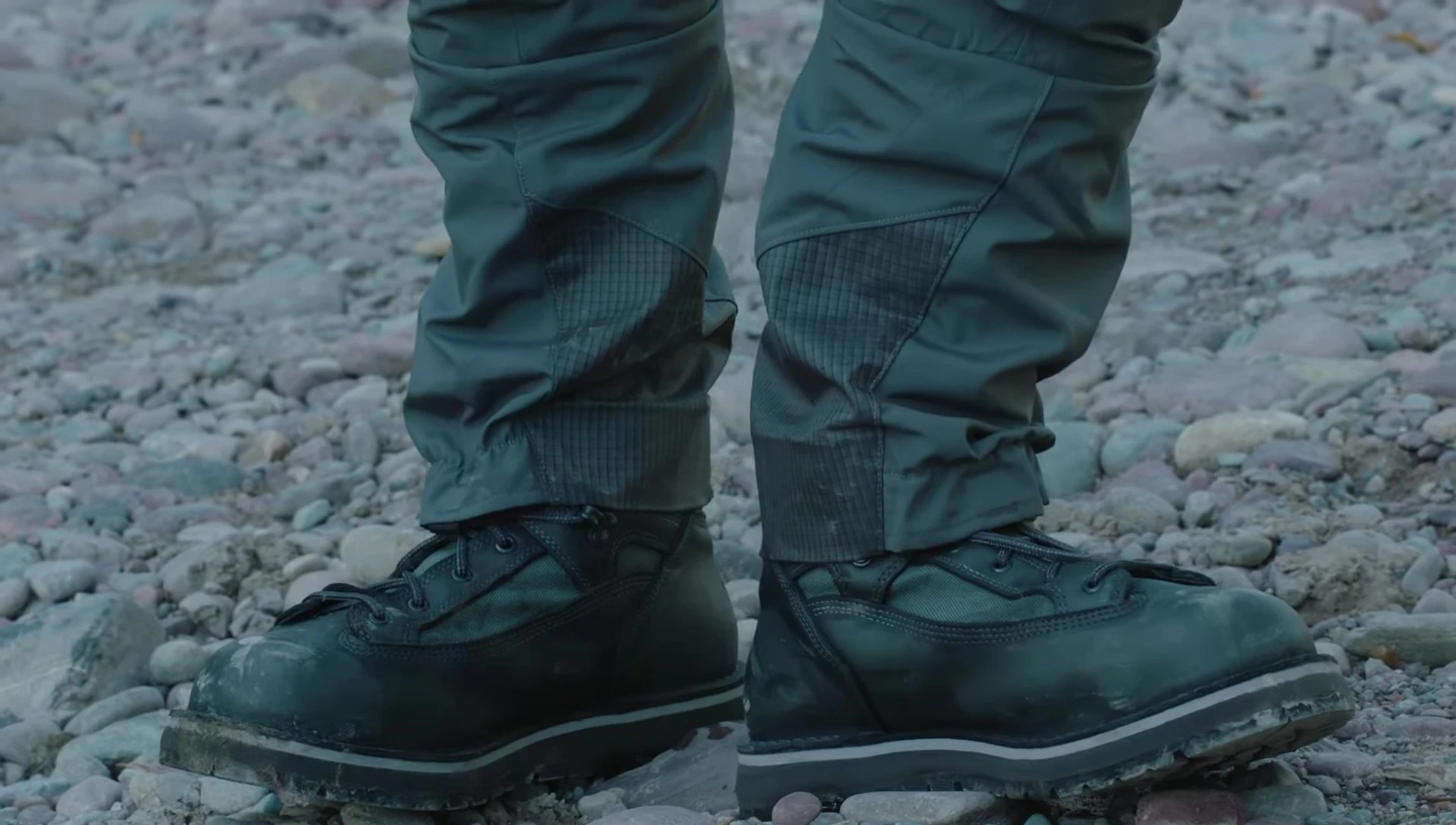 Close-up of the heavy-duty black hole fabric scuff guards.