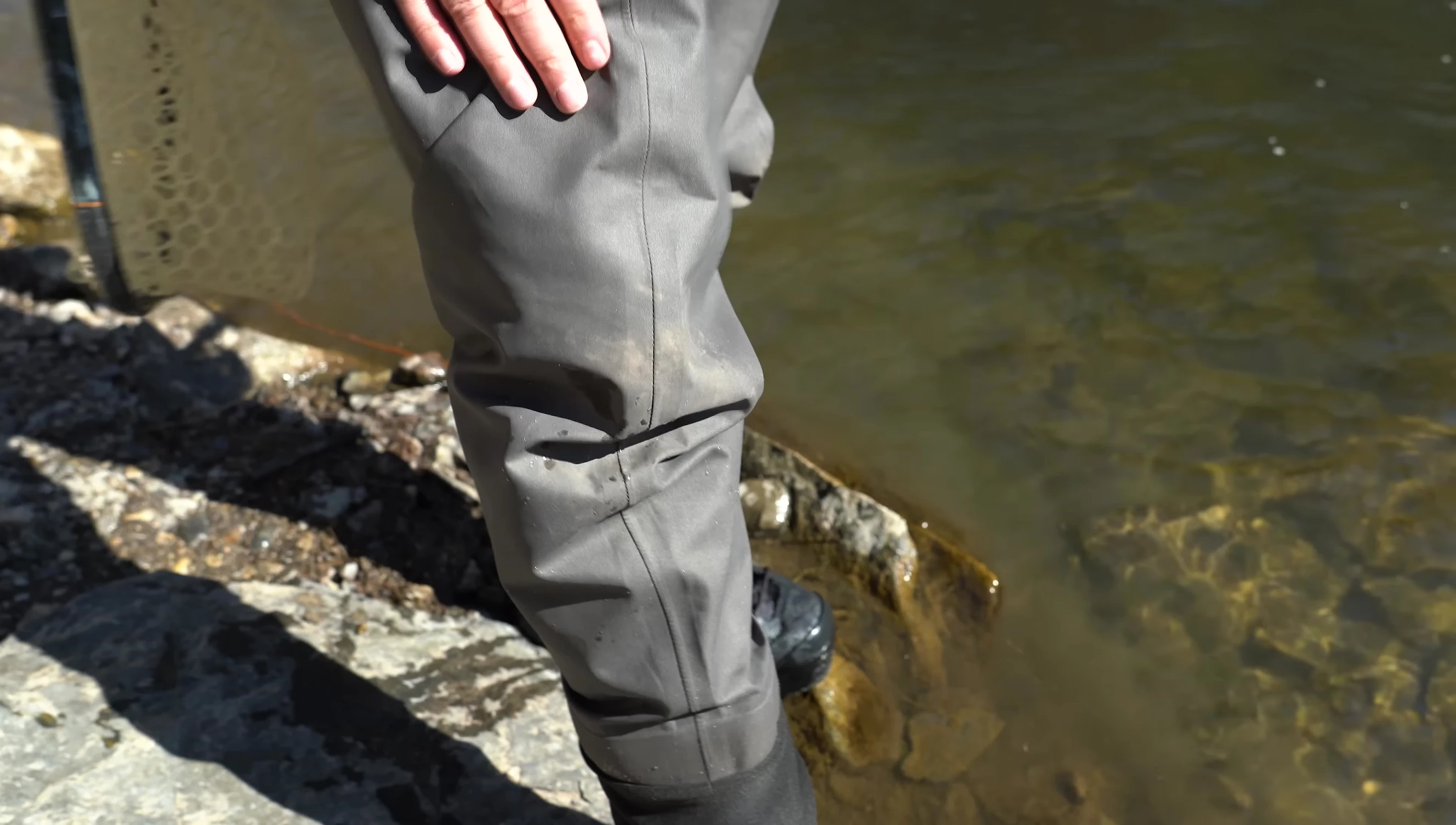 Close-up showcasing the durable construction of the Simms G3 waders.
