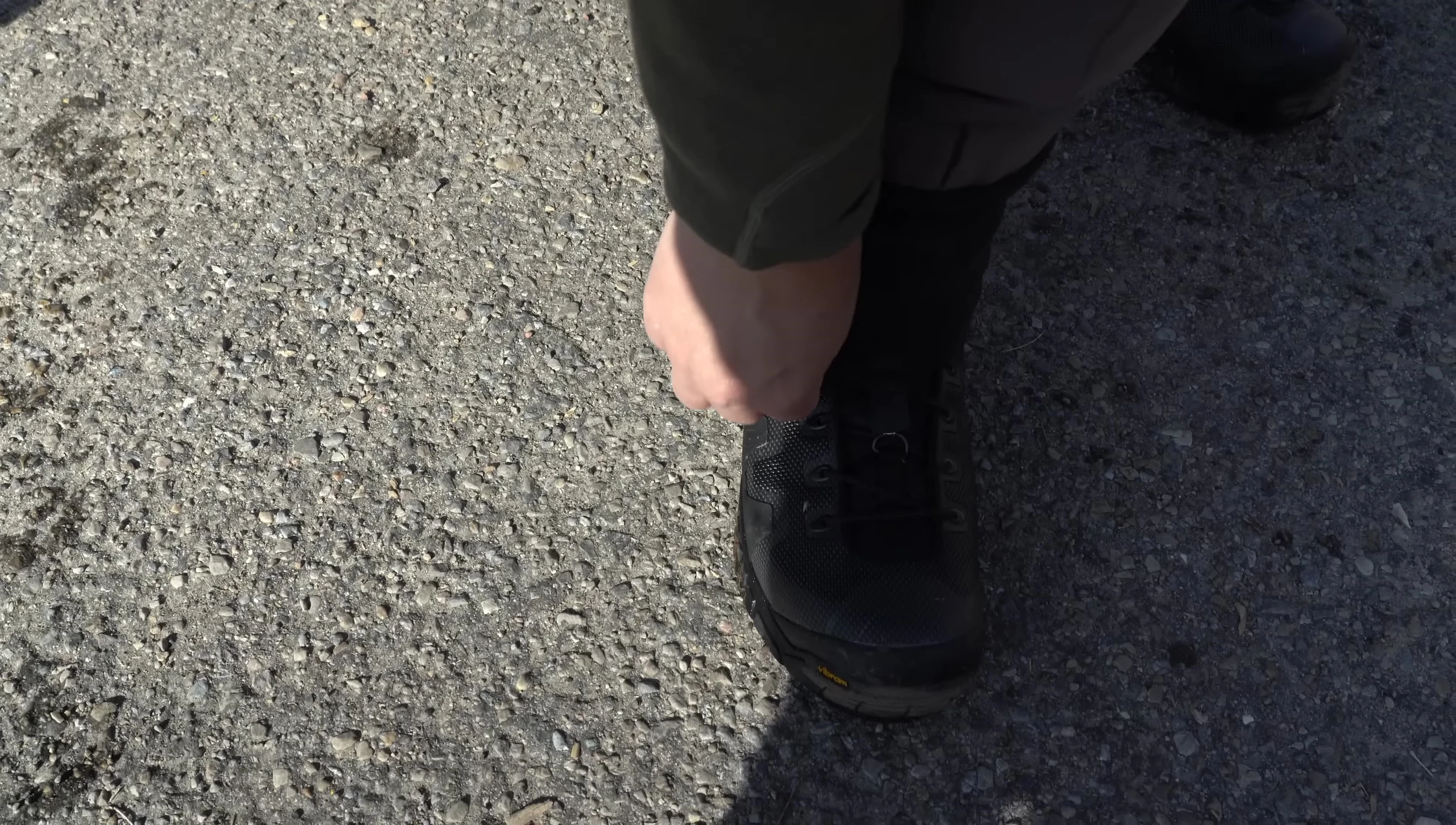 Close-up of the G4 wader's neoprene gravel guards and hook-and-loop closure.