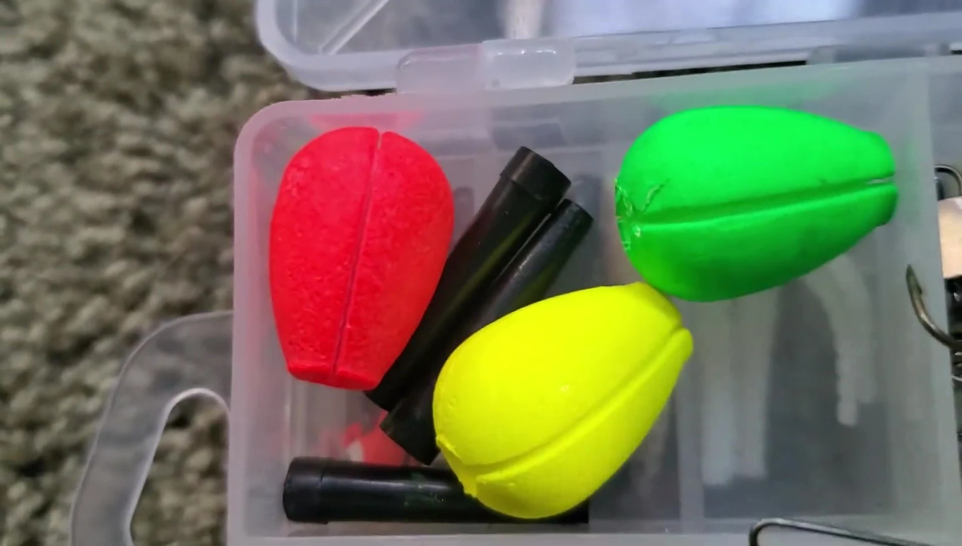 Close-up of the bobbers in the top compartment.