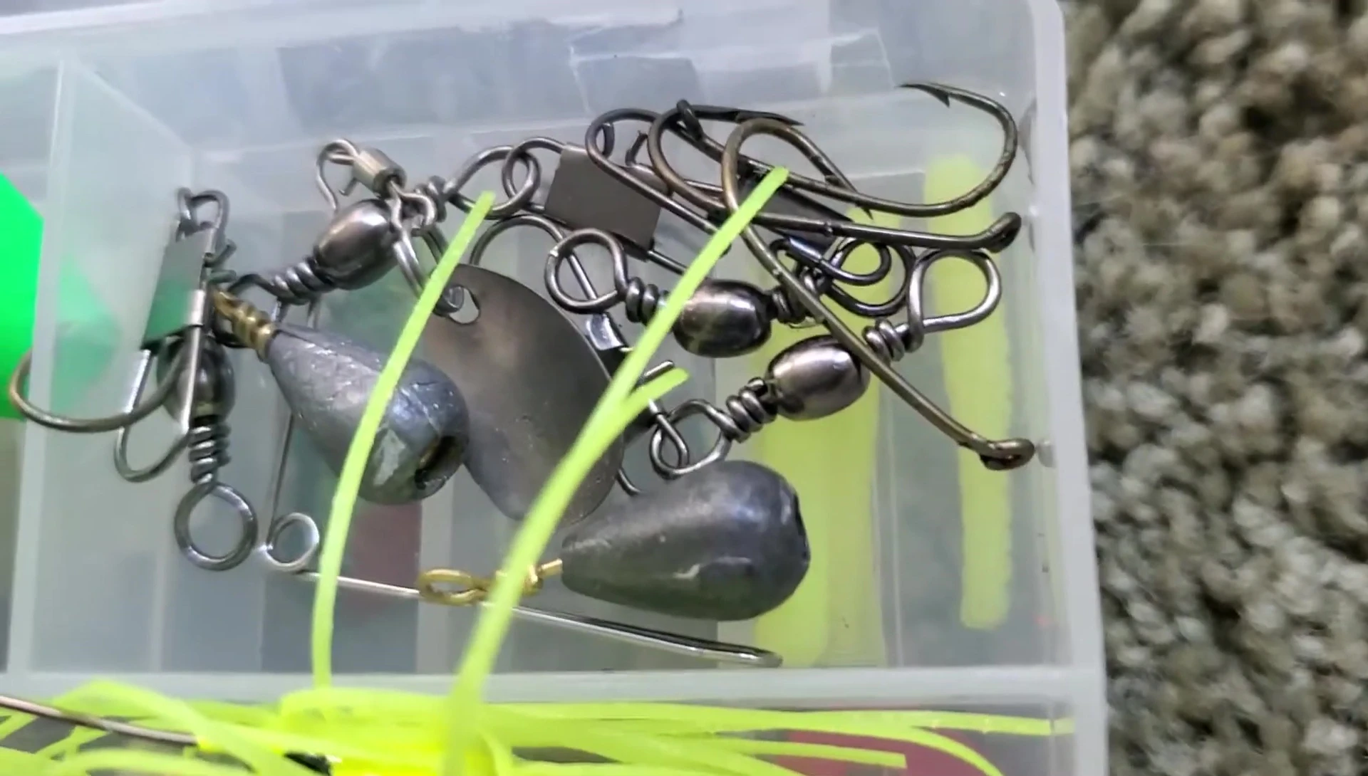 Shot showing the weights, hooks, and spinner in the top compartment.