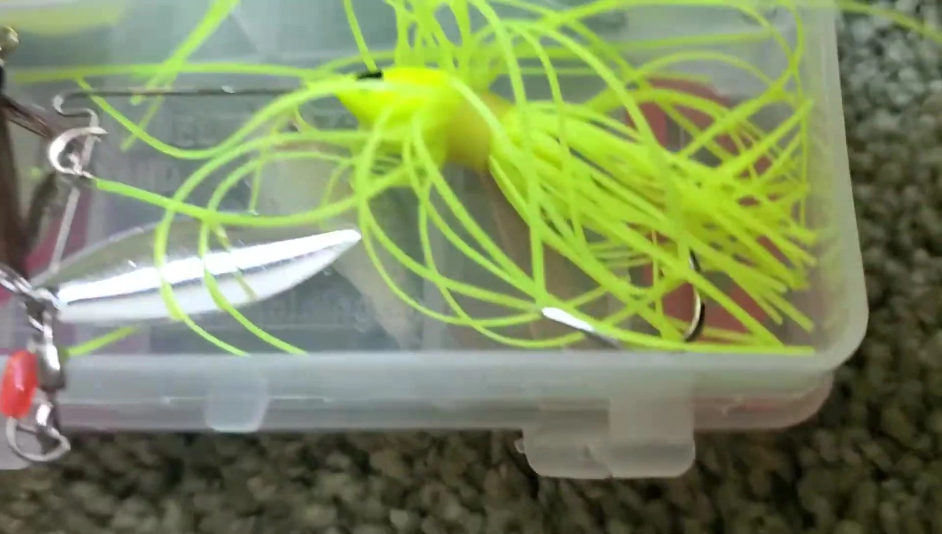 Close-up of the jig and spinnerbait in the bottom compartment.