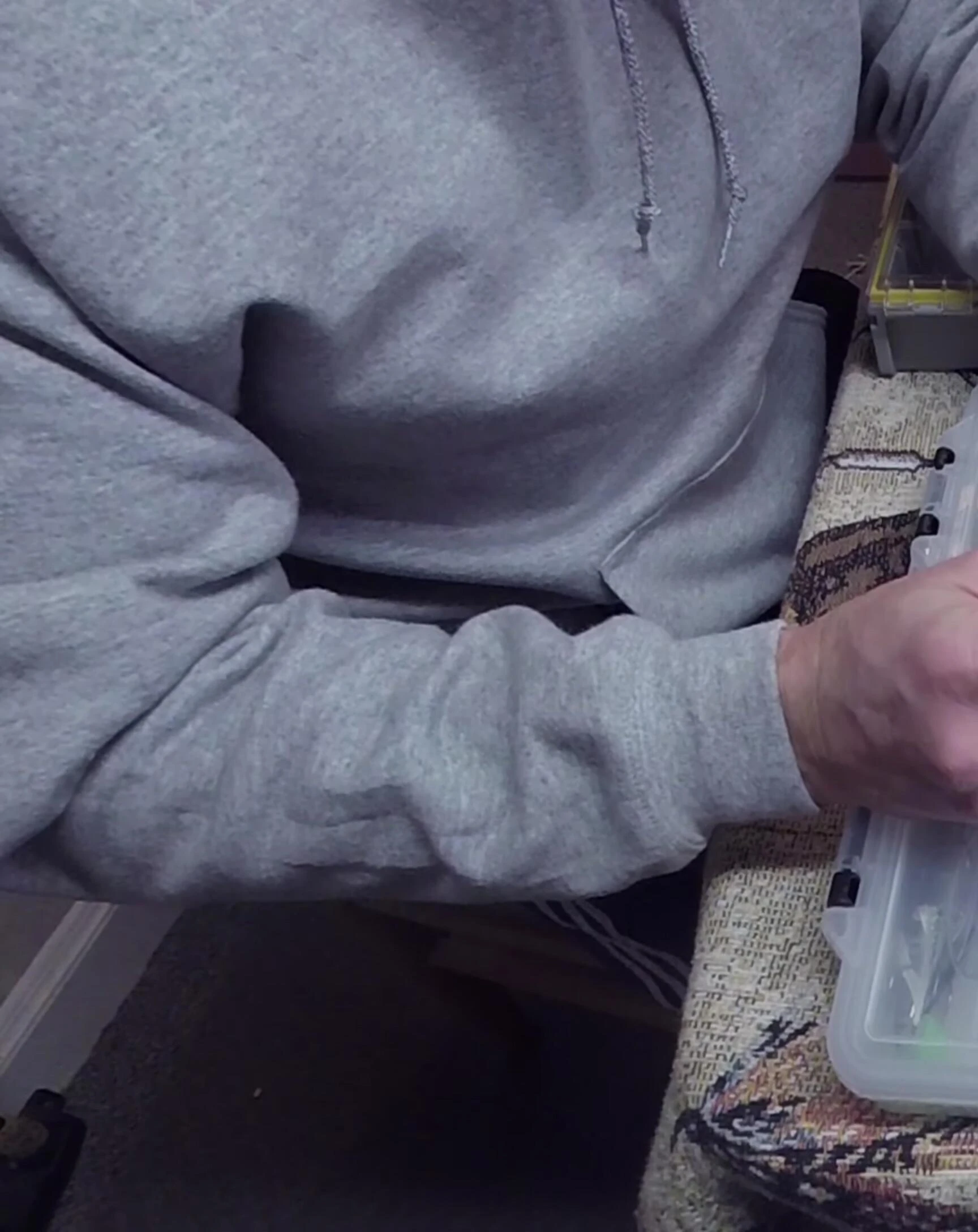 The presenter displays the water wicking system within the box.