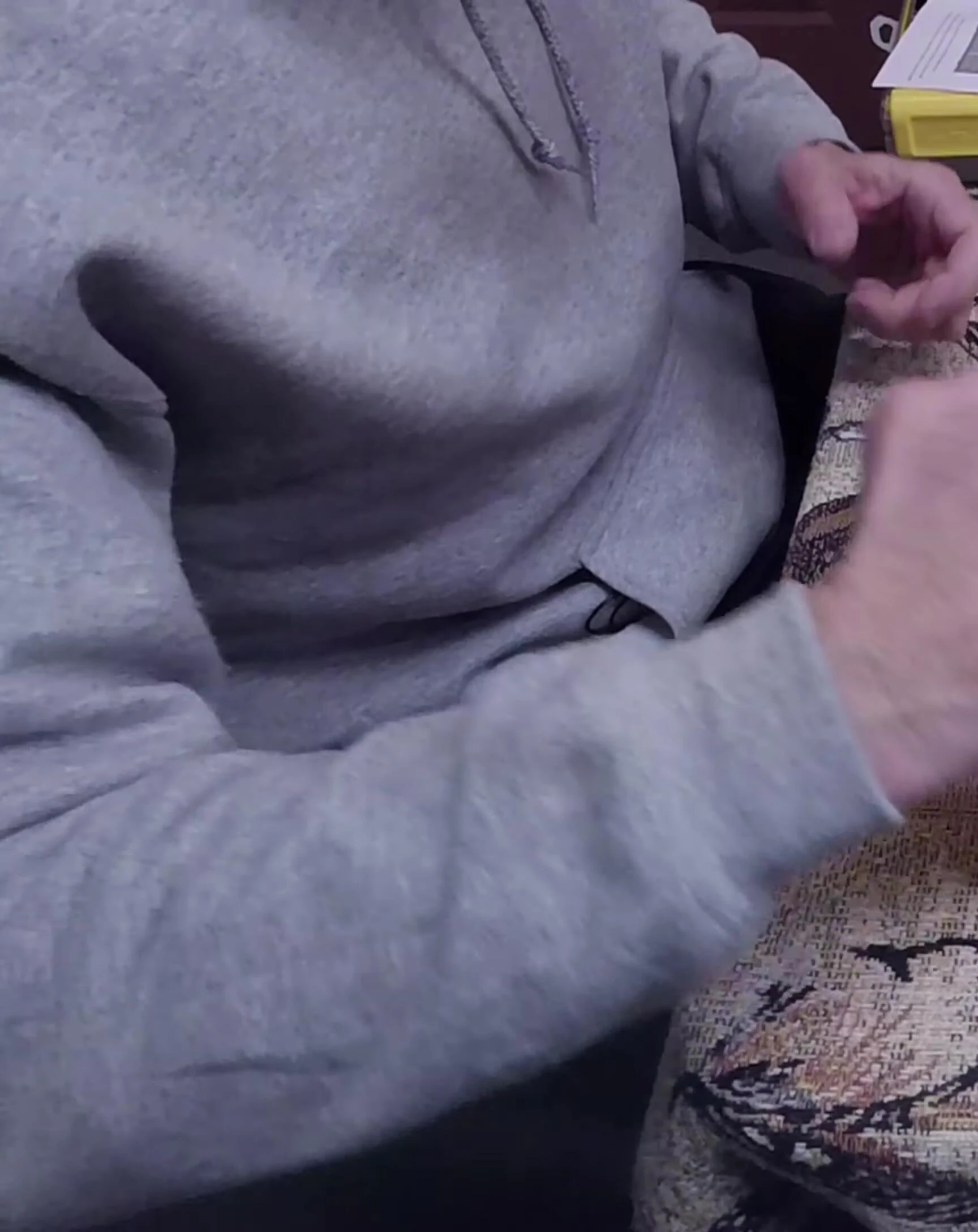 The presenter highlights the perforated design of the dividers.