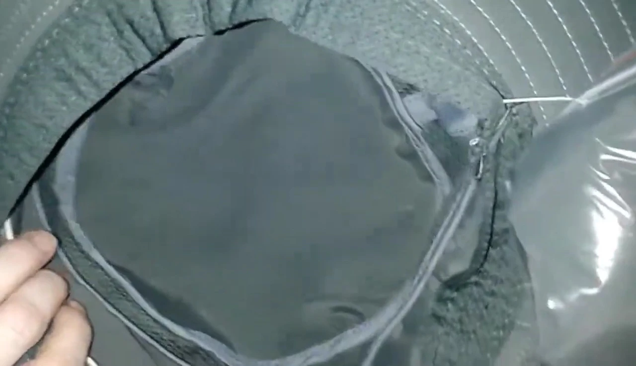 Shot showing the detailed stitching of the hat.