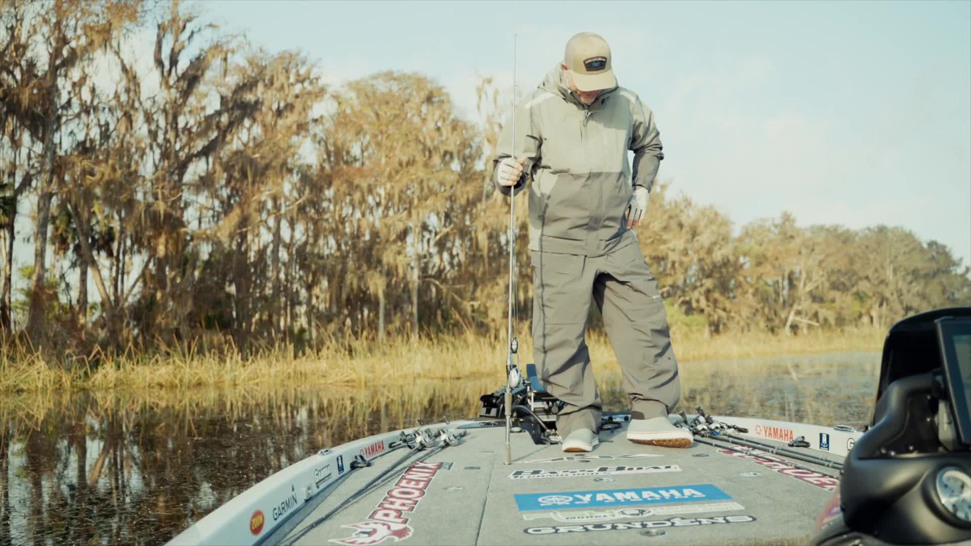 Randall Tharp highlighting the thick insole of the boots.