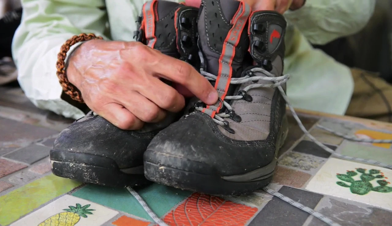 Detail shot highlighting the D-ring feature on the boots.