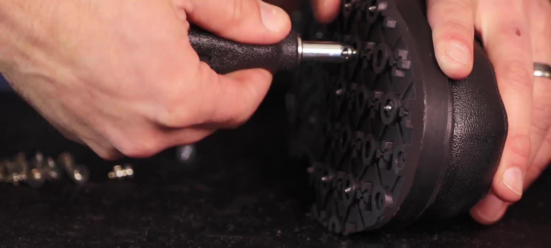 Showing the stud's shoulder flush with the rubber interior.