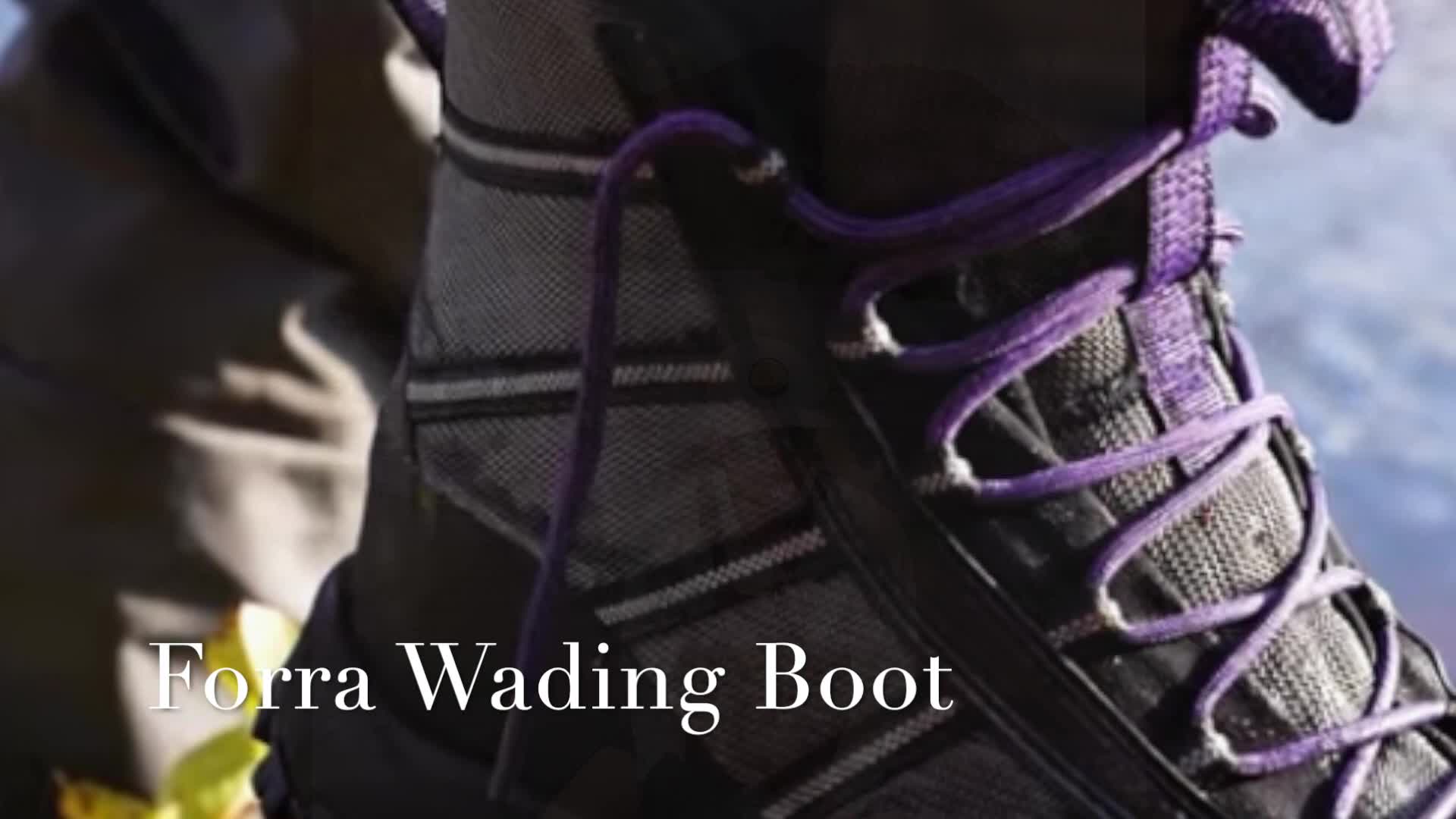 Initial shot of the reviewer holding the Patagonia Forra wading boots.