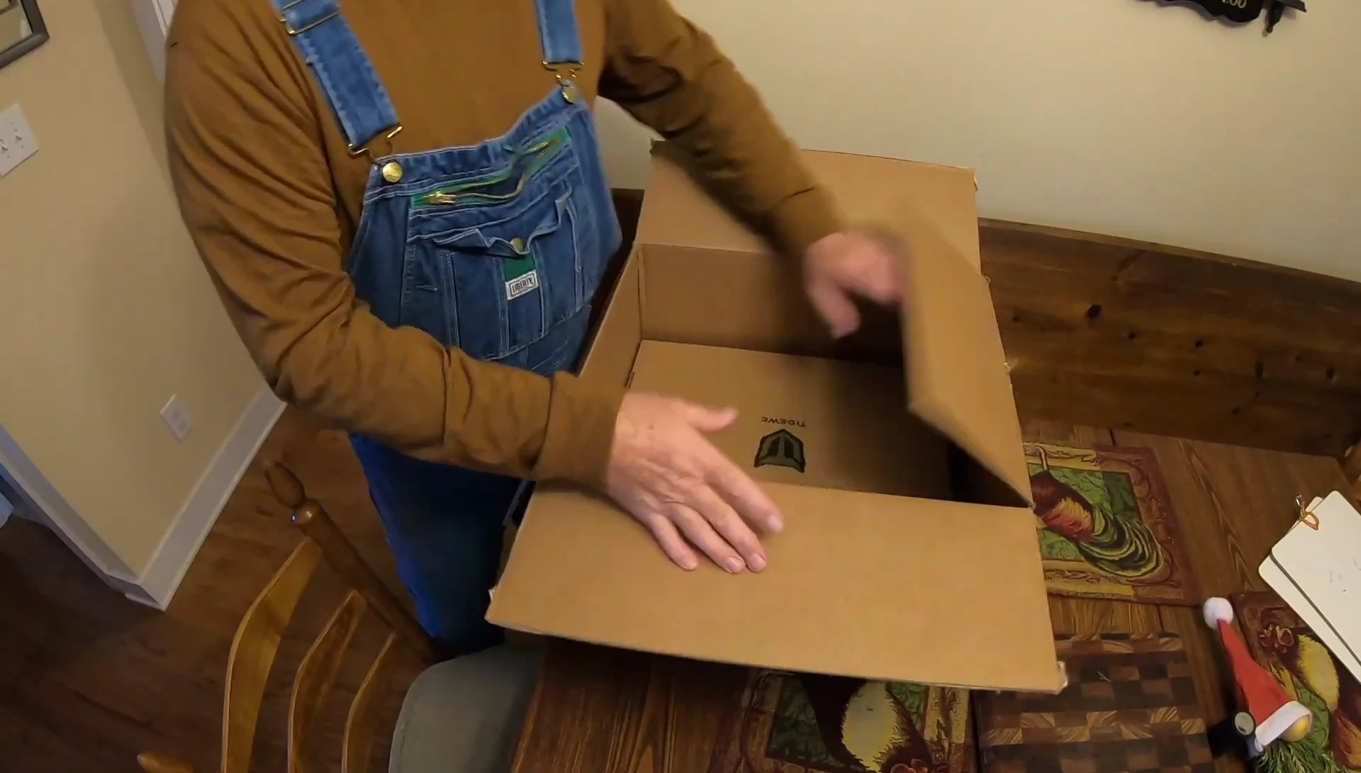 Close-up shot of the TideWe boots still in the box.