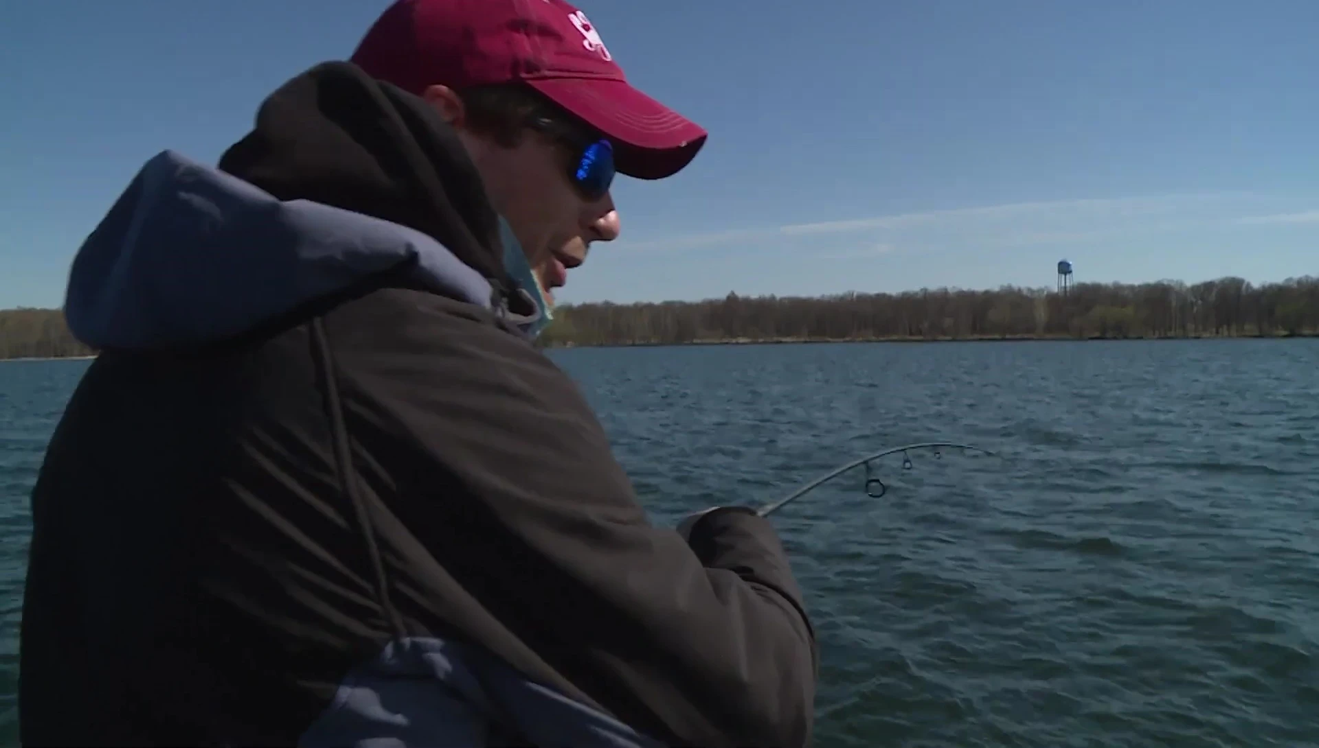 Fisherman reacting to a fish bite