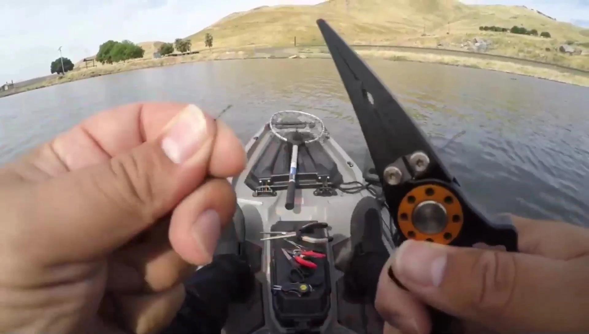The pliers effortlessly cutting through four layers of 50-pound braid.