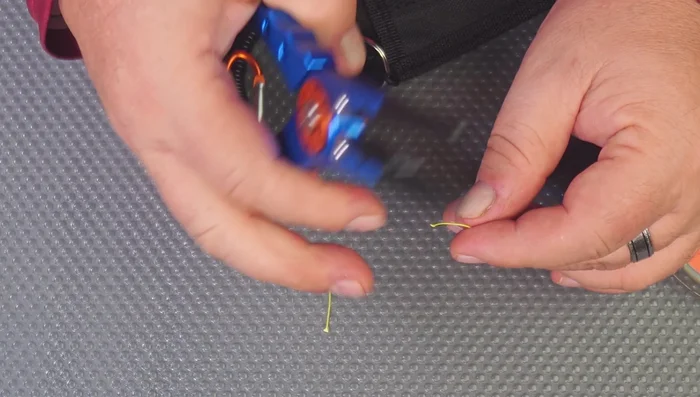 Testing 7.9-inch Multi-tool Pliers' Cutting Capabilities: Successfully cuts braid and fishing line.