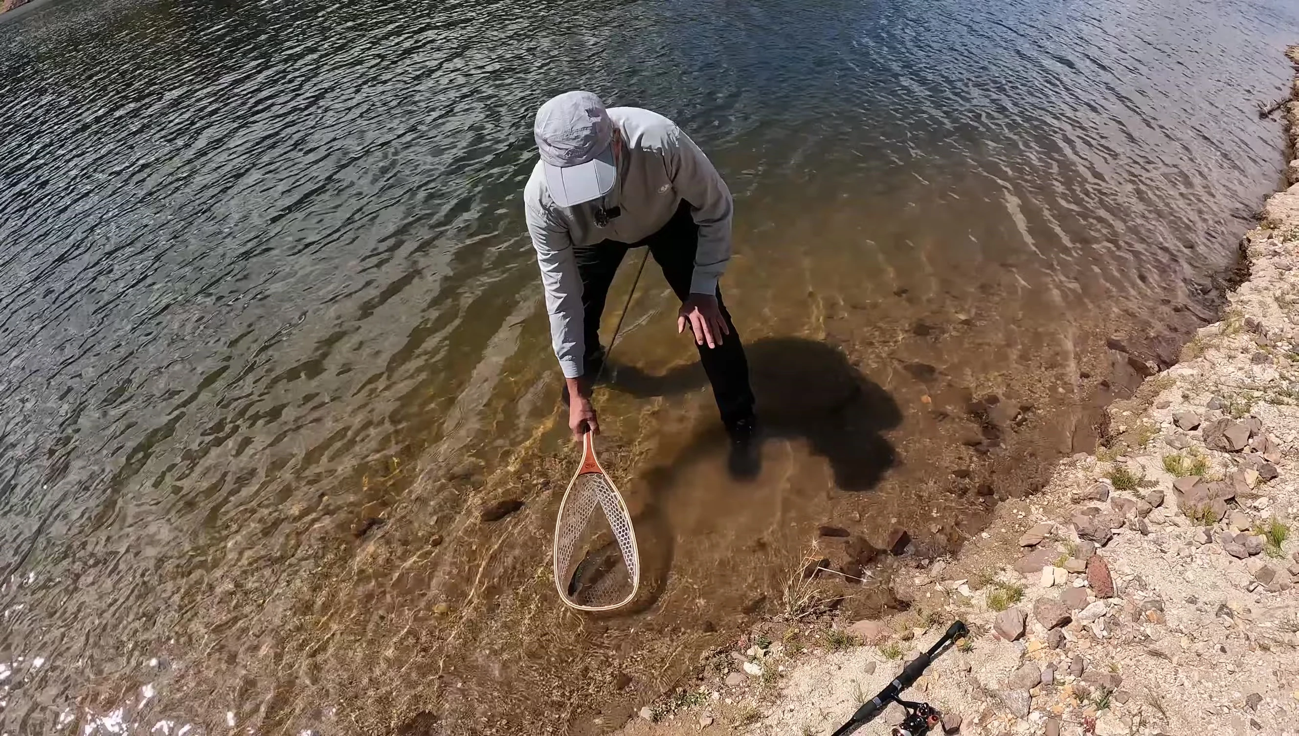 The speaker wearing the Paramount wading boots, showing their comfort and functionality.