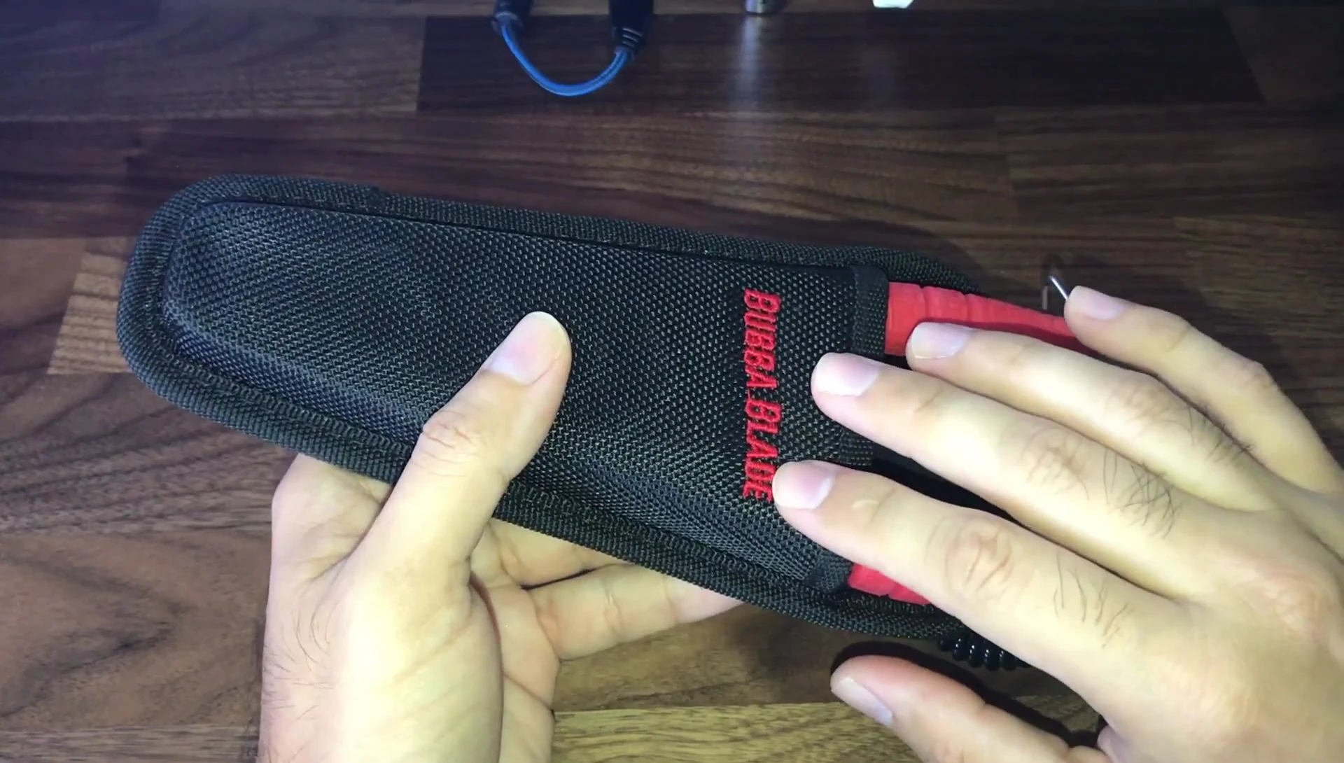 Image of the user holding the pliers.